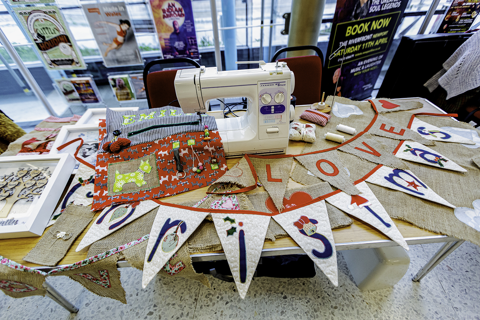 Table with sewing machine and bunting