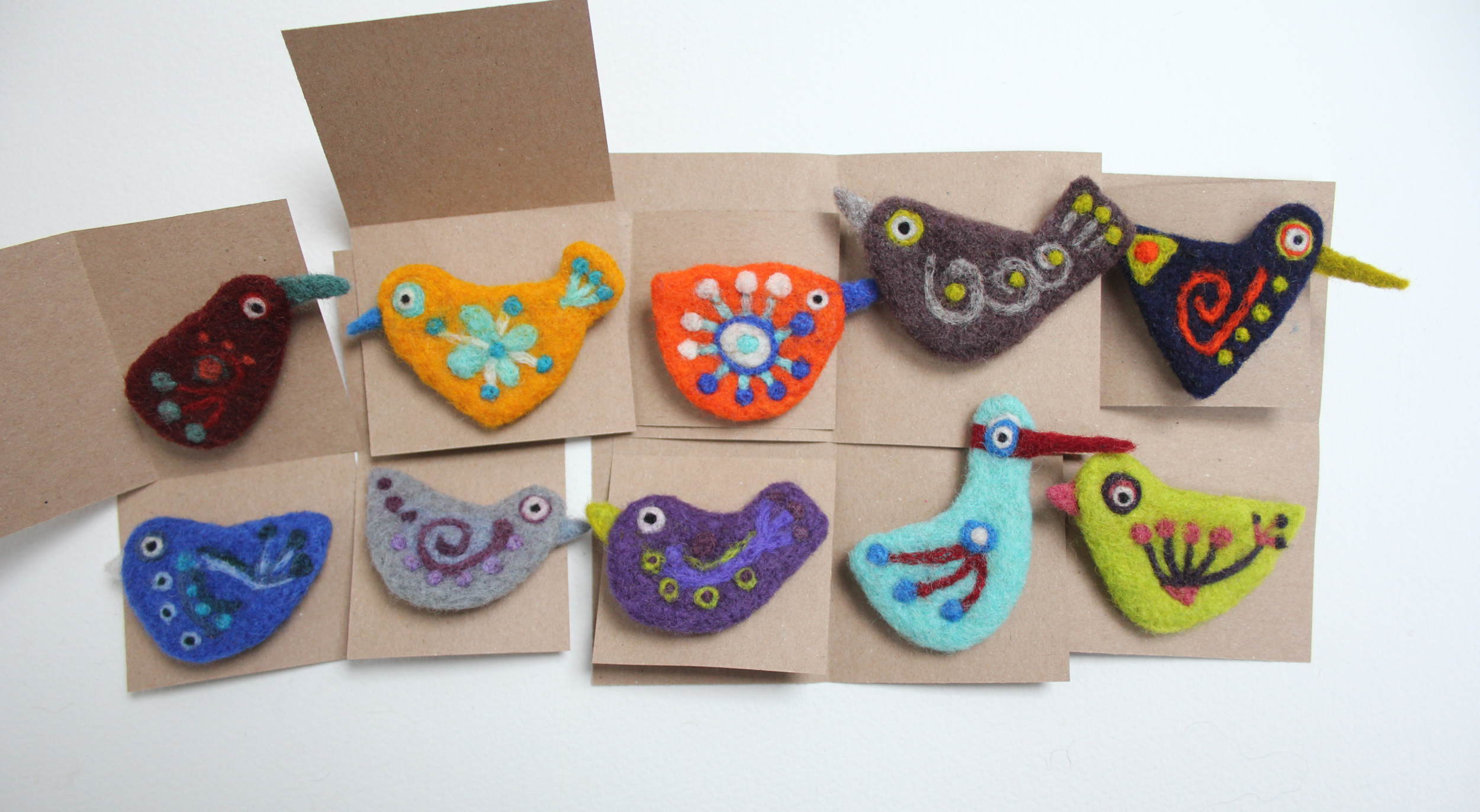 Selection of colourful little felt birds