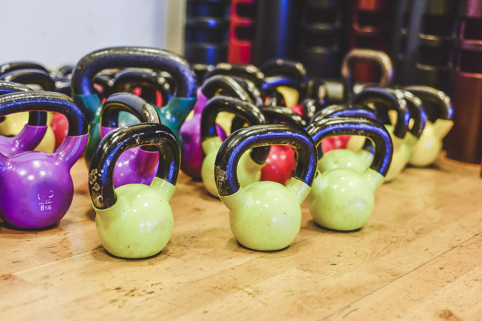 a range of kettle bell weights at velodrome